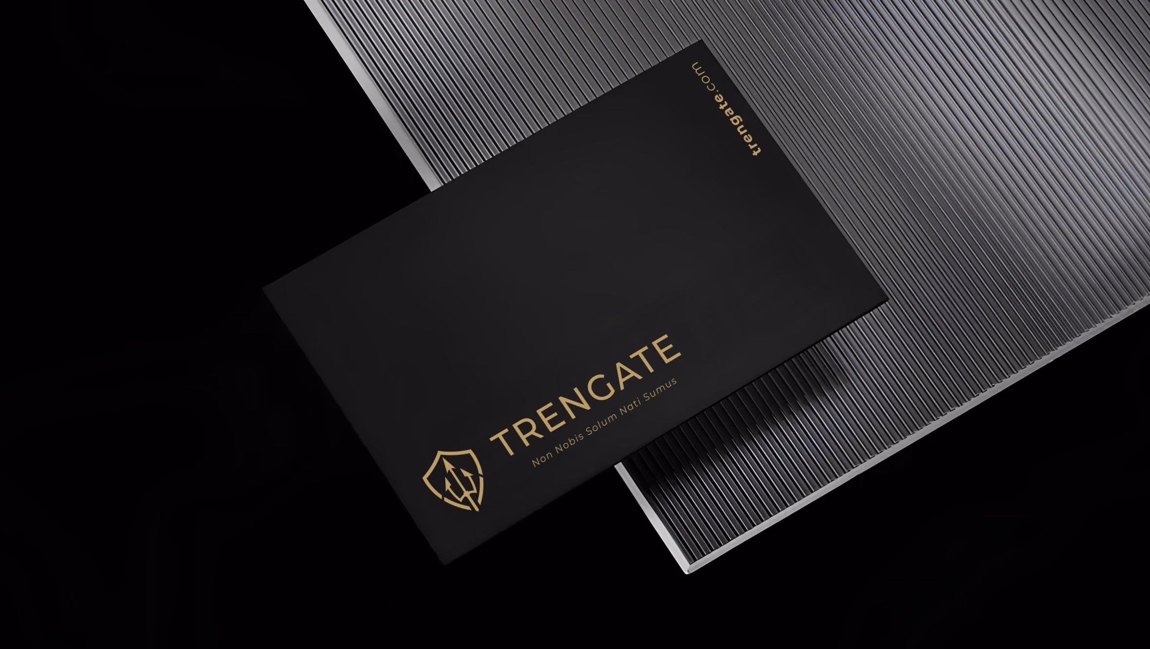 Trengate business card in black with a gold foil logo